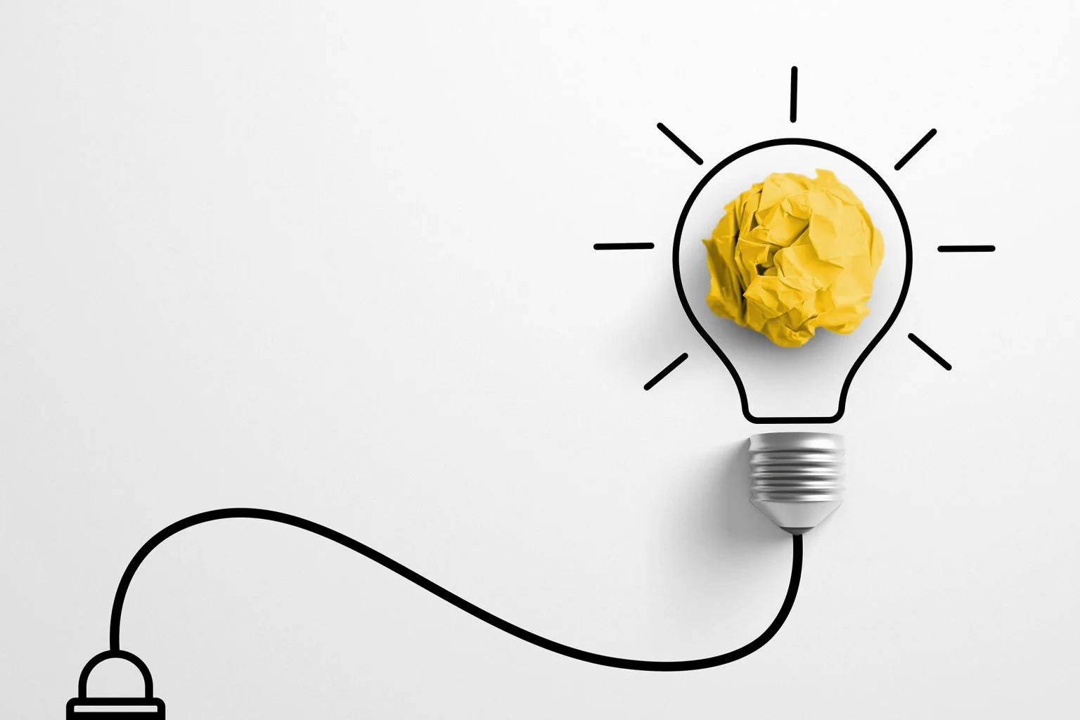 Paper scrap ball yellow colour with light bulb symbol on white background