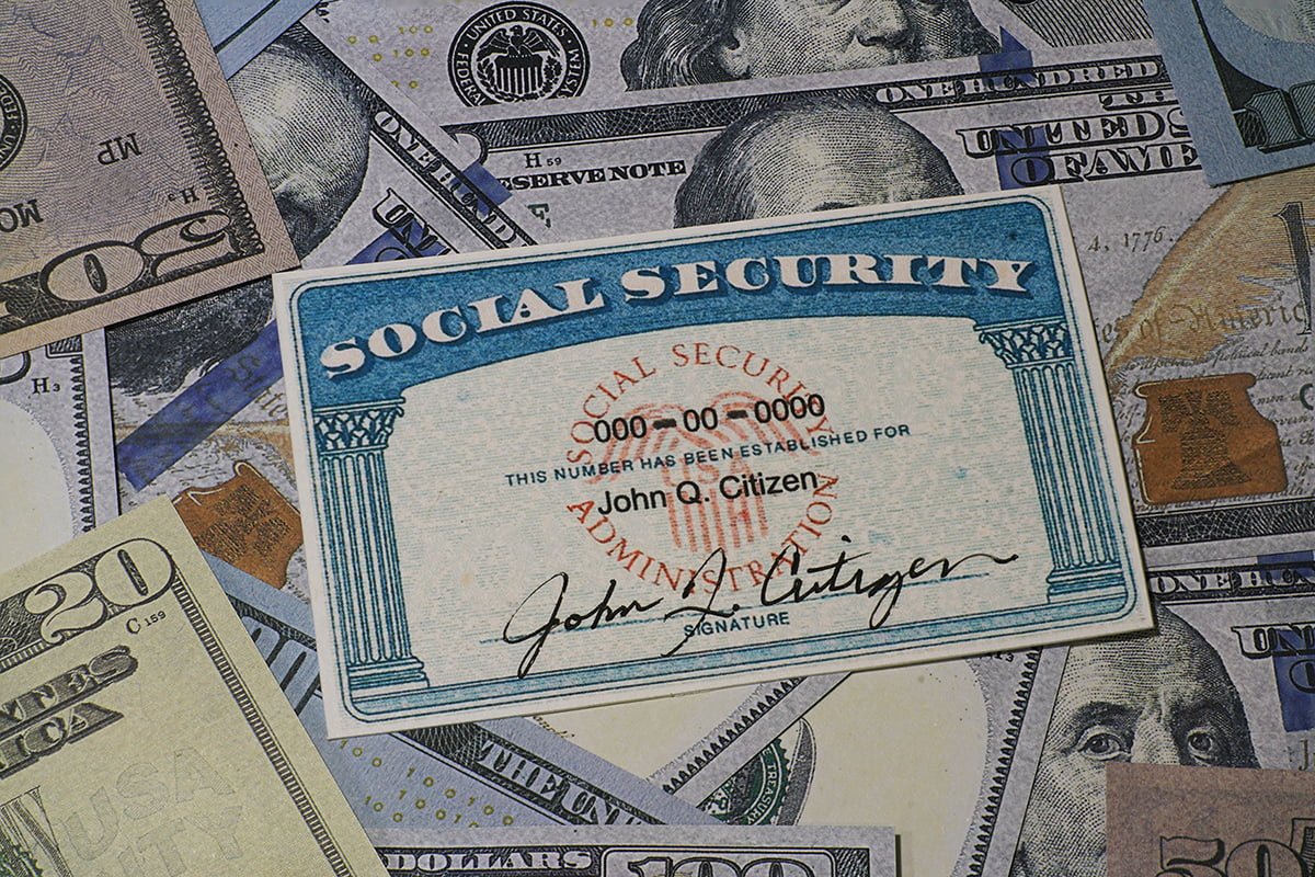 Fake Social security card on prop fake US currency