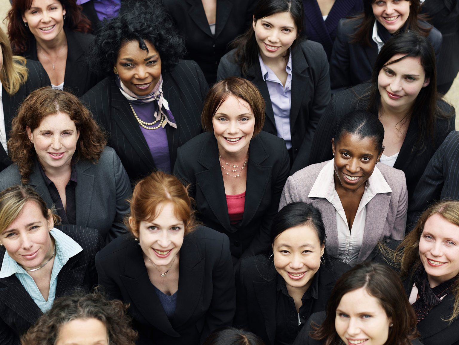Elevated view of a group of smiling multiethnic businesswomen