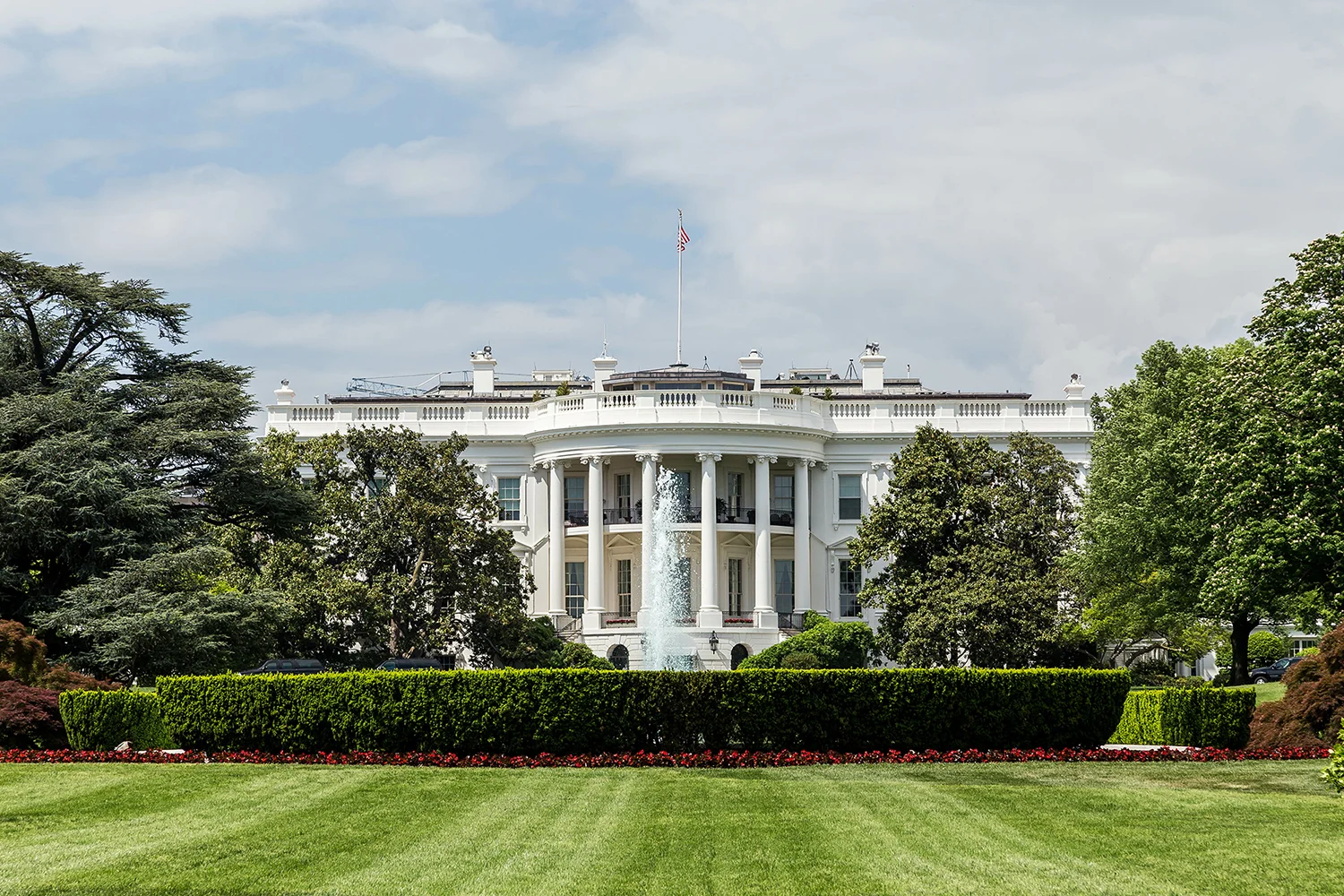 The White House in Washington DC from the South Lawn on a beautiful day