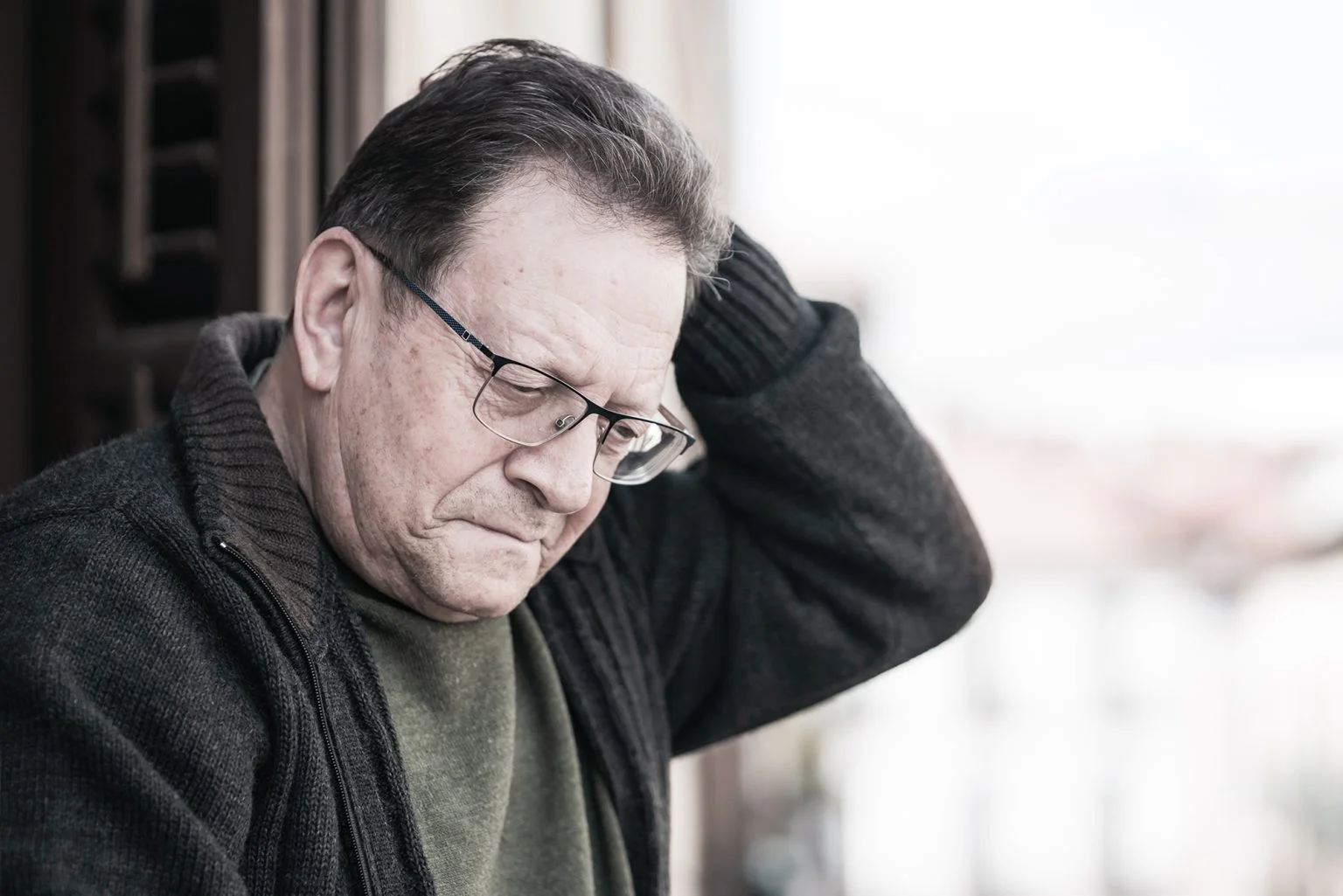 dramatic portrait of sad and depressed mature man