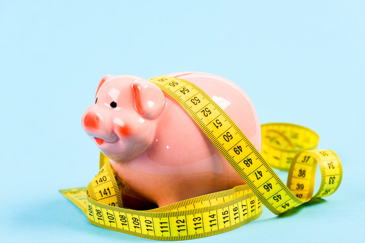 Piggy bank with measuring tape