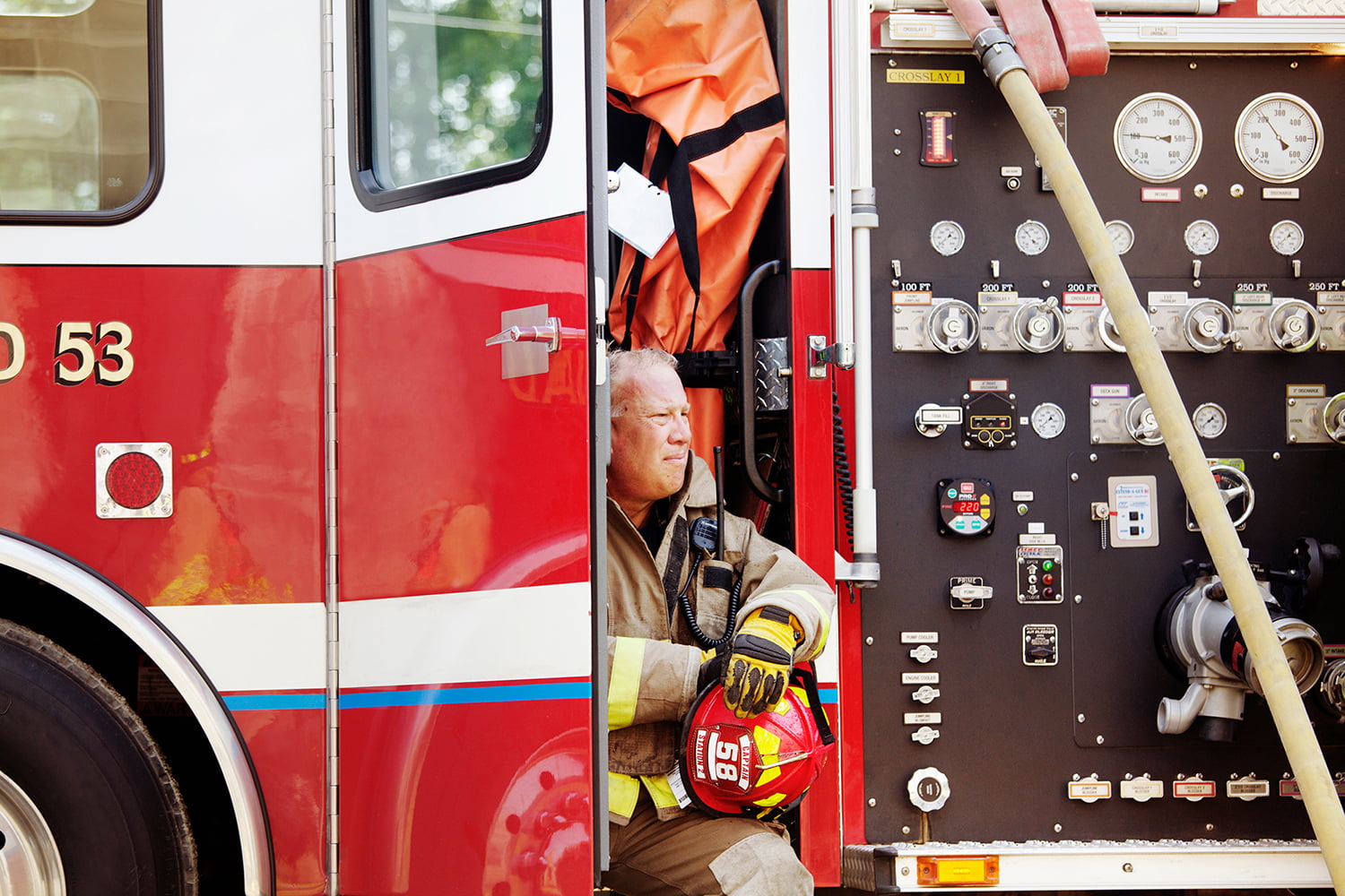 Fireman sitting in fire engine