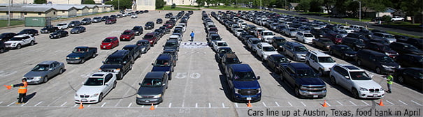 Cars in line at a food back in Austin Texas