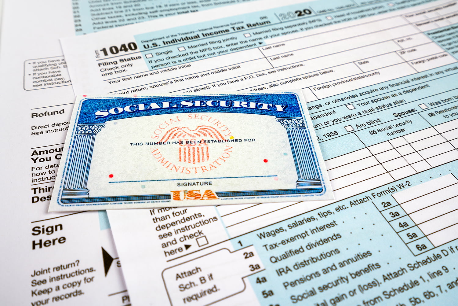 Blank social security card, and 1040 us individual tax income return form