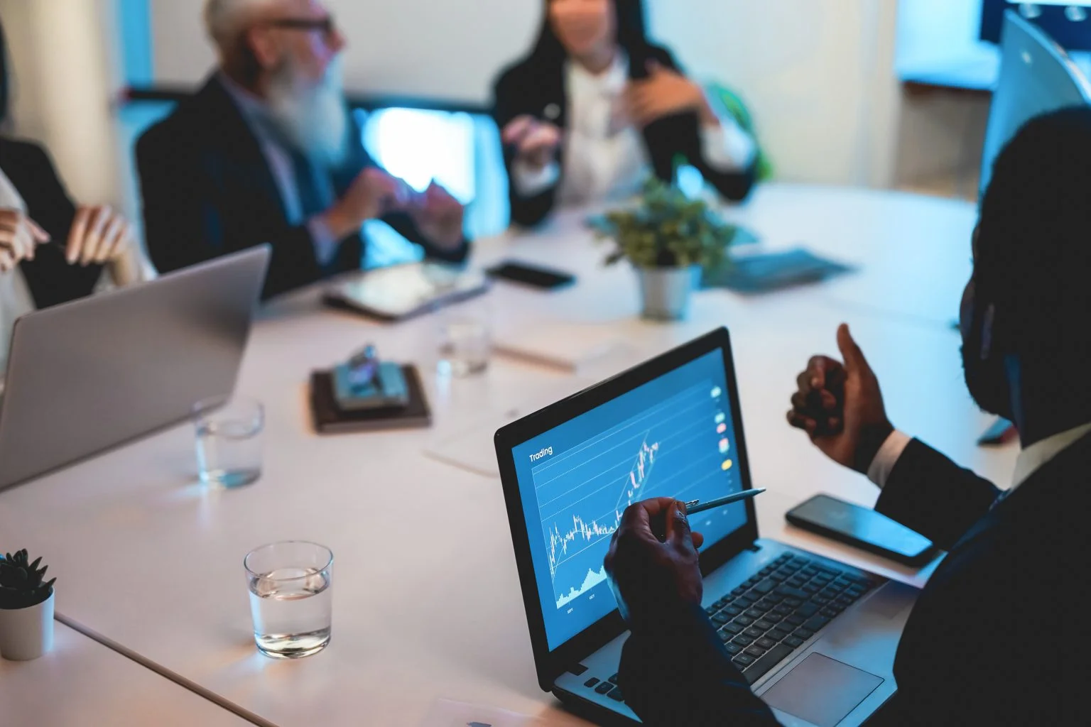 Business trader team doing blockchain analysis inside hedge fund office