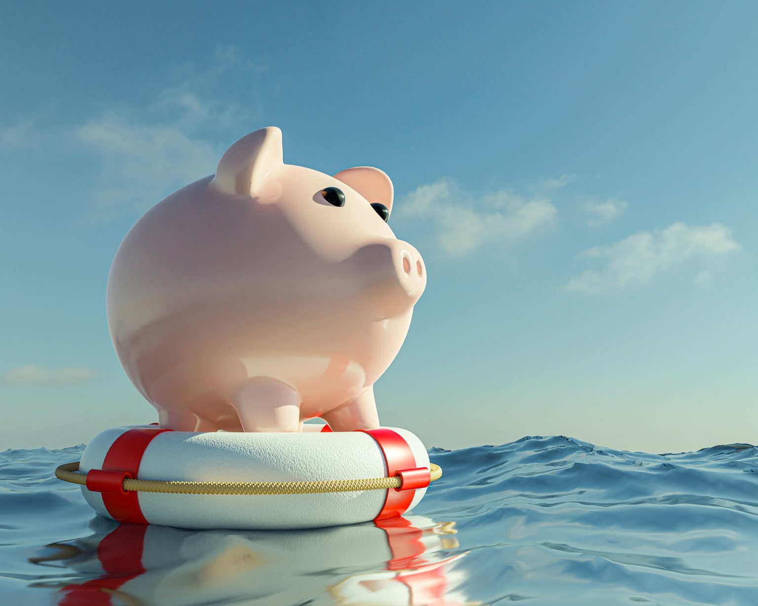 piggy bank on life buoy on water