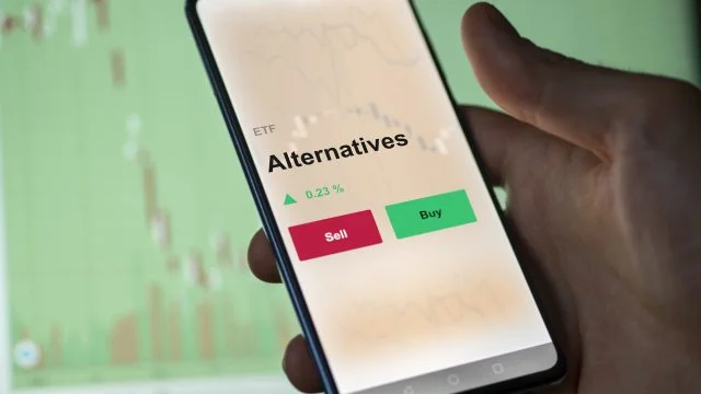 An investor's analyzing the alternatives etf fund on a screen