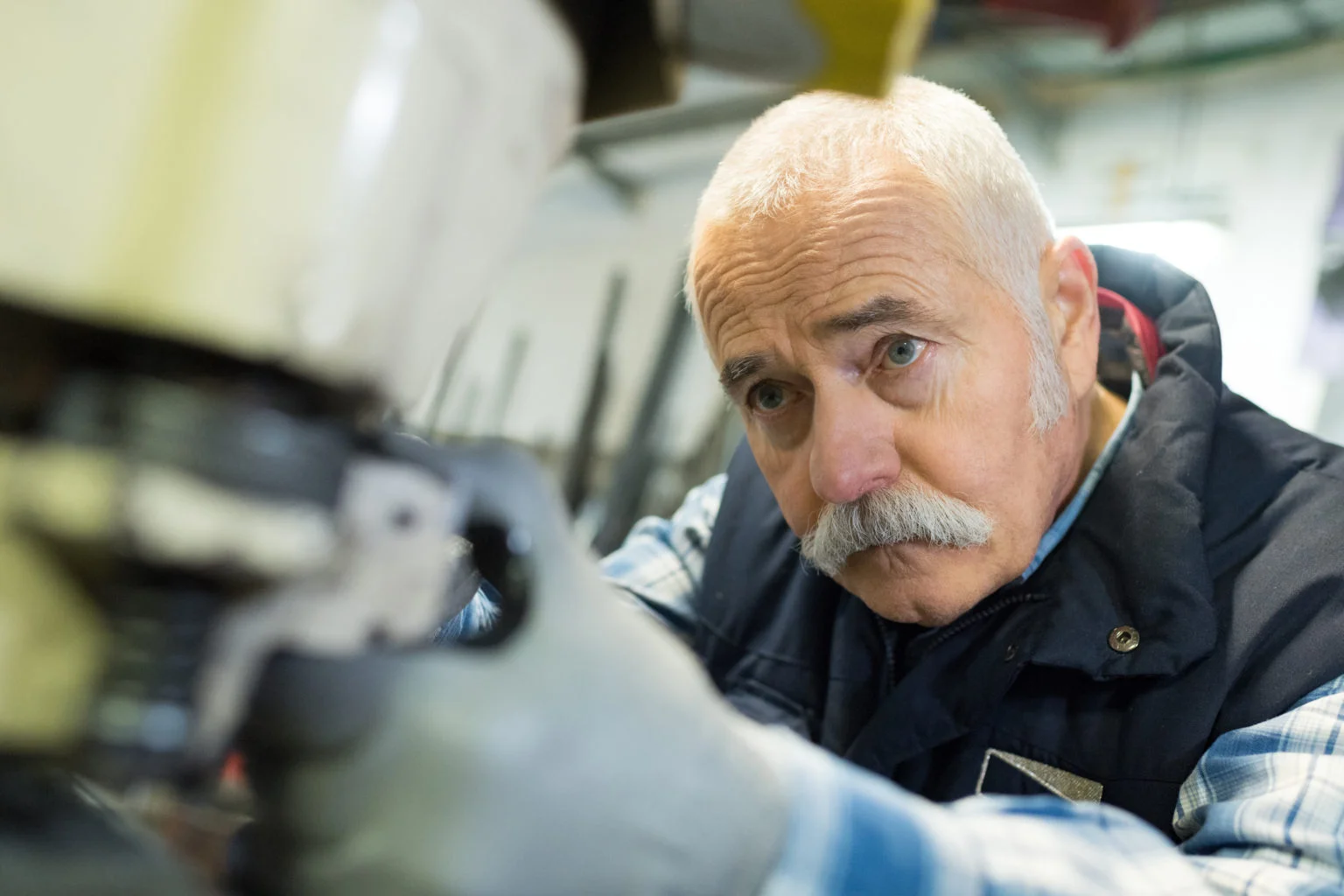 Aged,Man,Working,In,An,Industrial,Factory