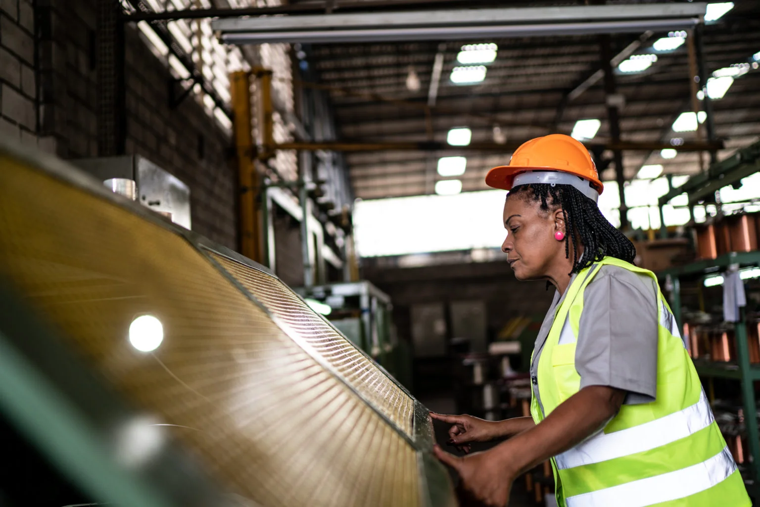 Mature woman working in a factory / warehouse
