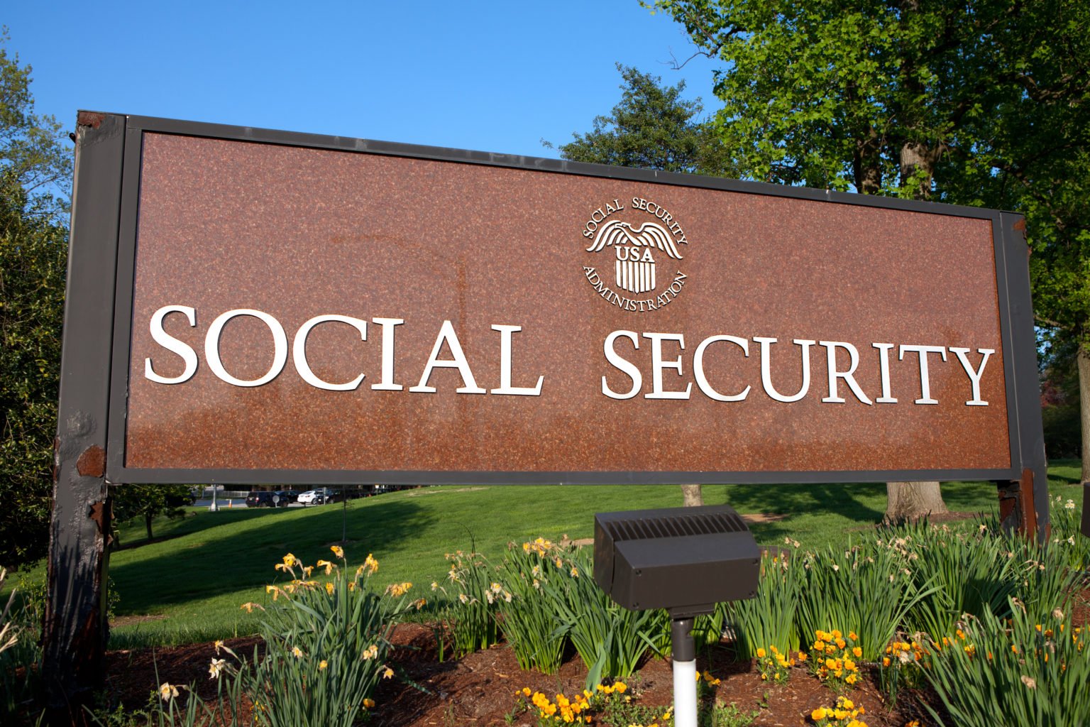 Social Security sign in a garden