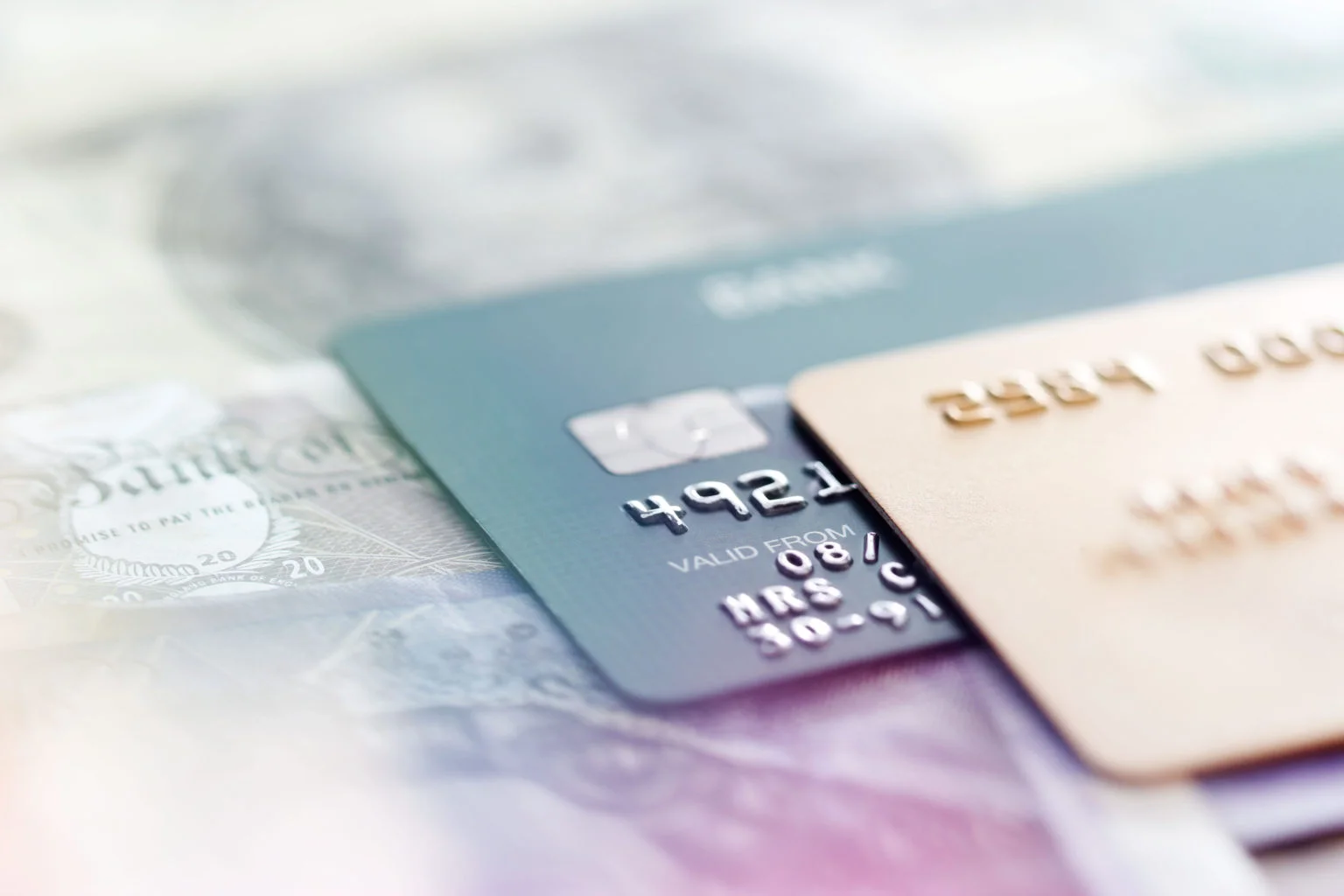 Credit cards on a banknotes background