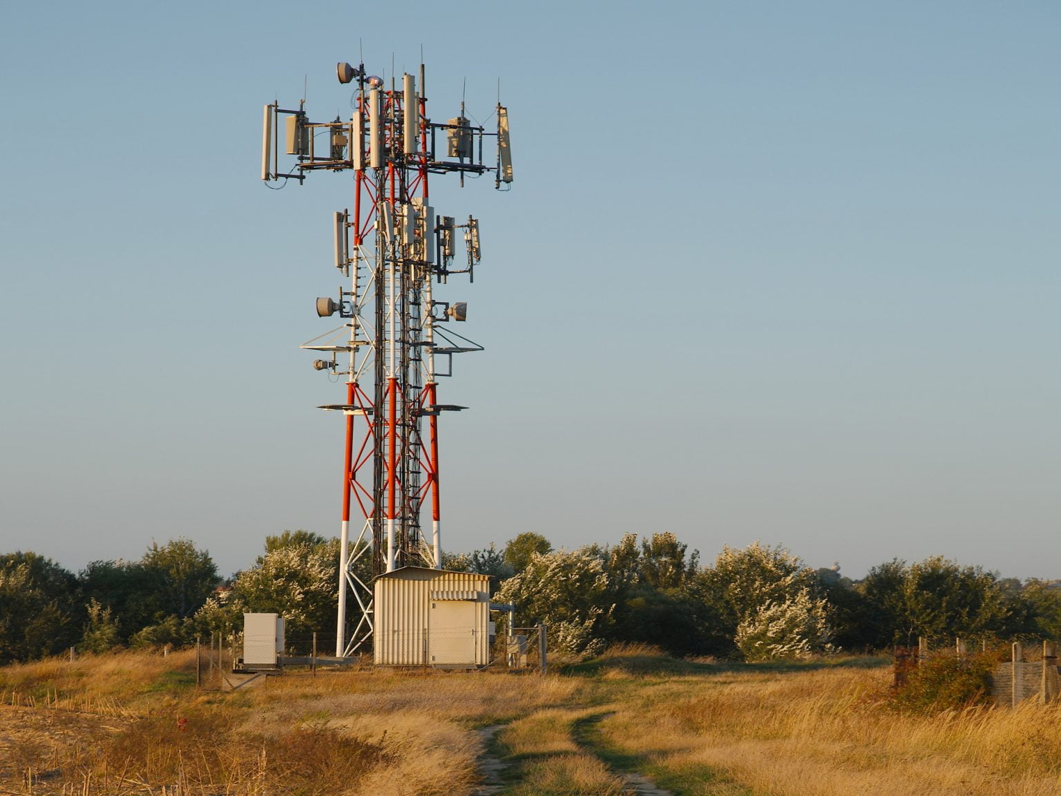 Broadband tower in a field