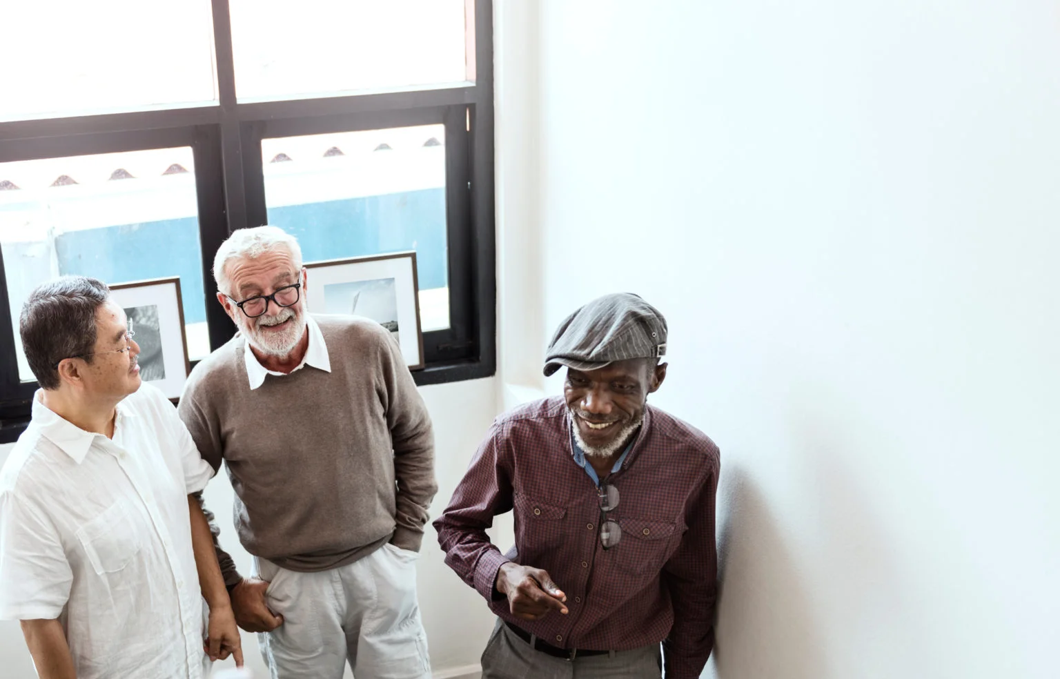 Group of senior men in a stairwell