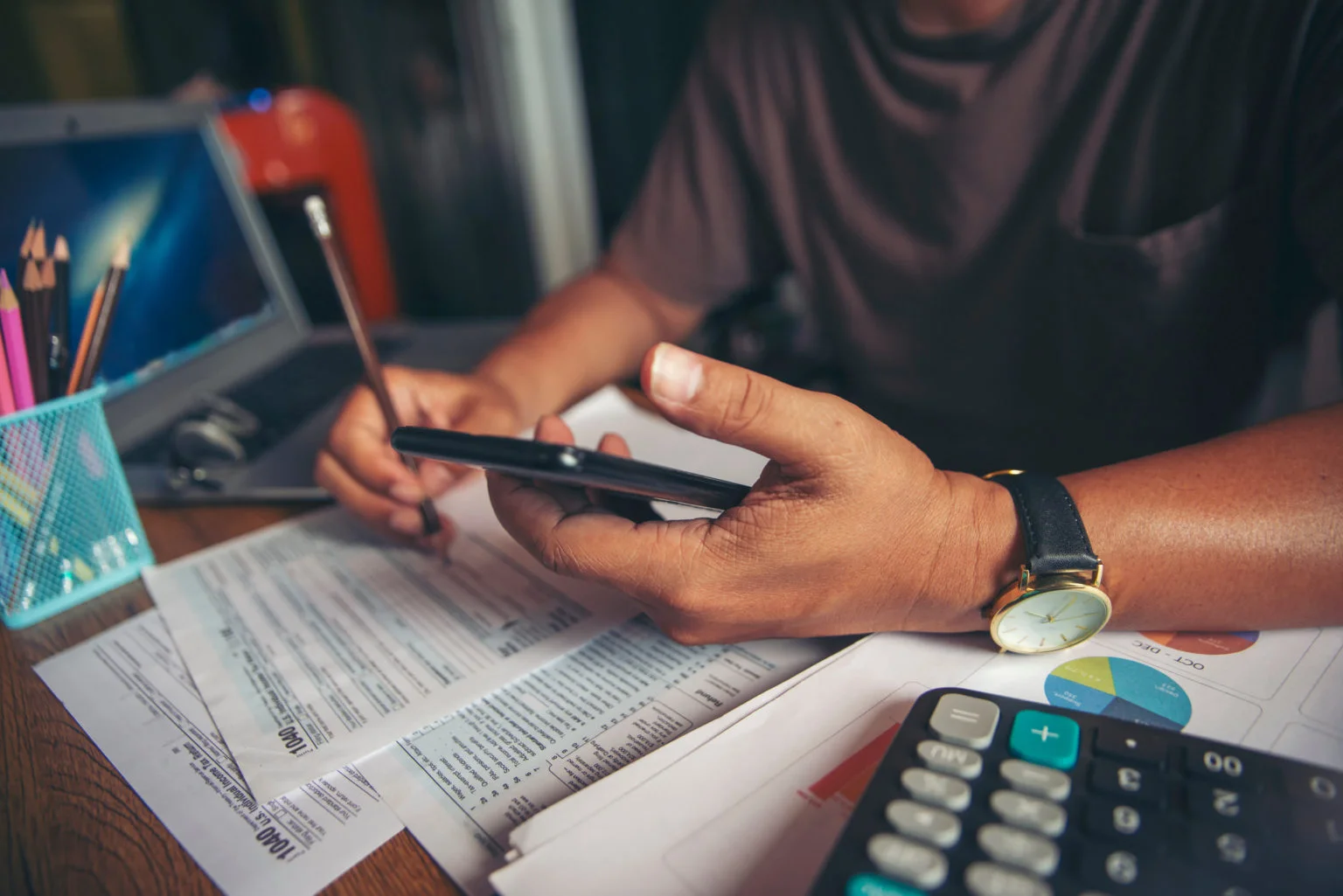 Person calculating a tax return