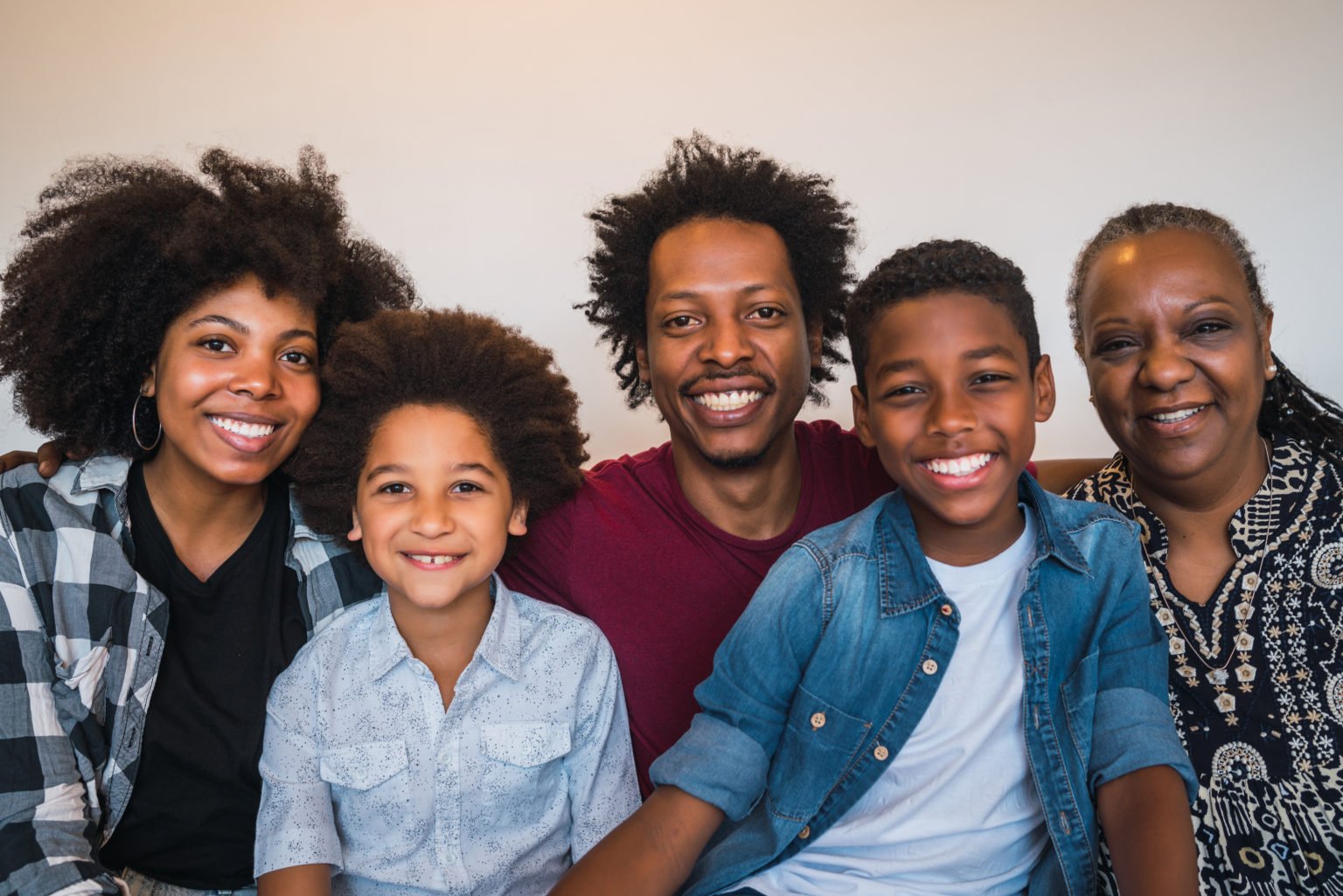 Portrait,Of,African,American,Multigenerational,Family,Looking,At,Camera,While