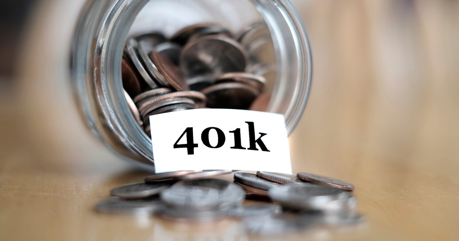 Coins in a jar with a note that says 401k