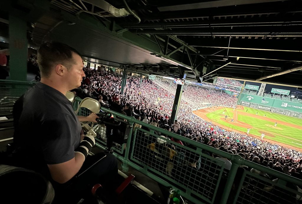 JT Realmuto chatting with family before a game at Fenway Park