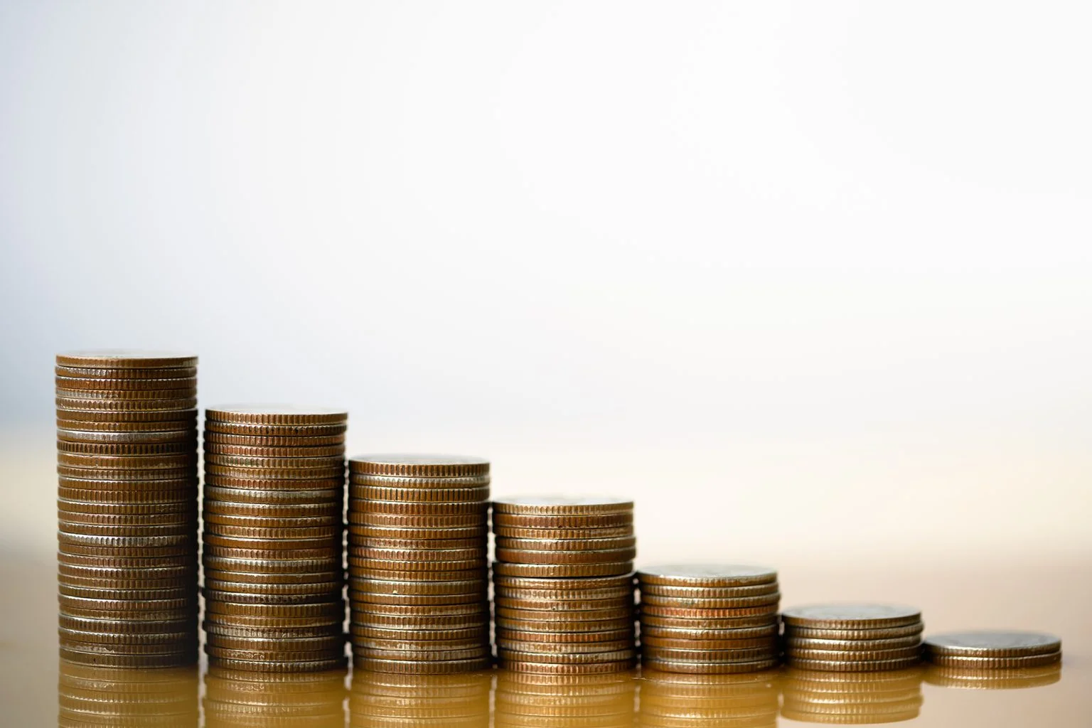 Stack of coins in decreasing size left to right