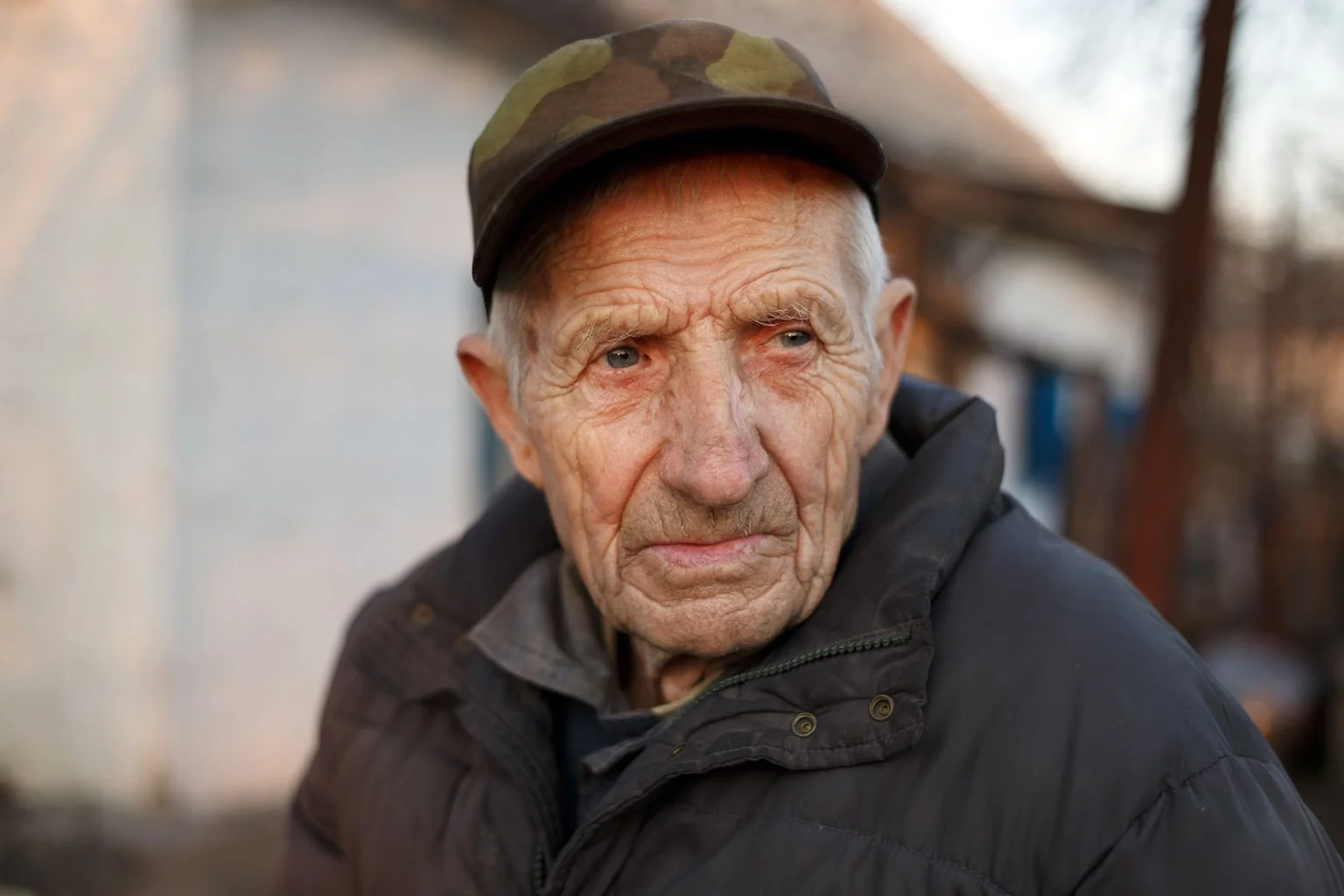 portrait senior man looking sad