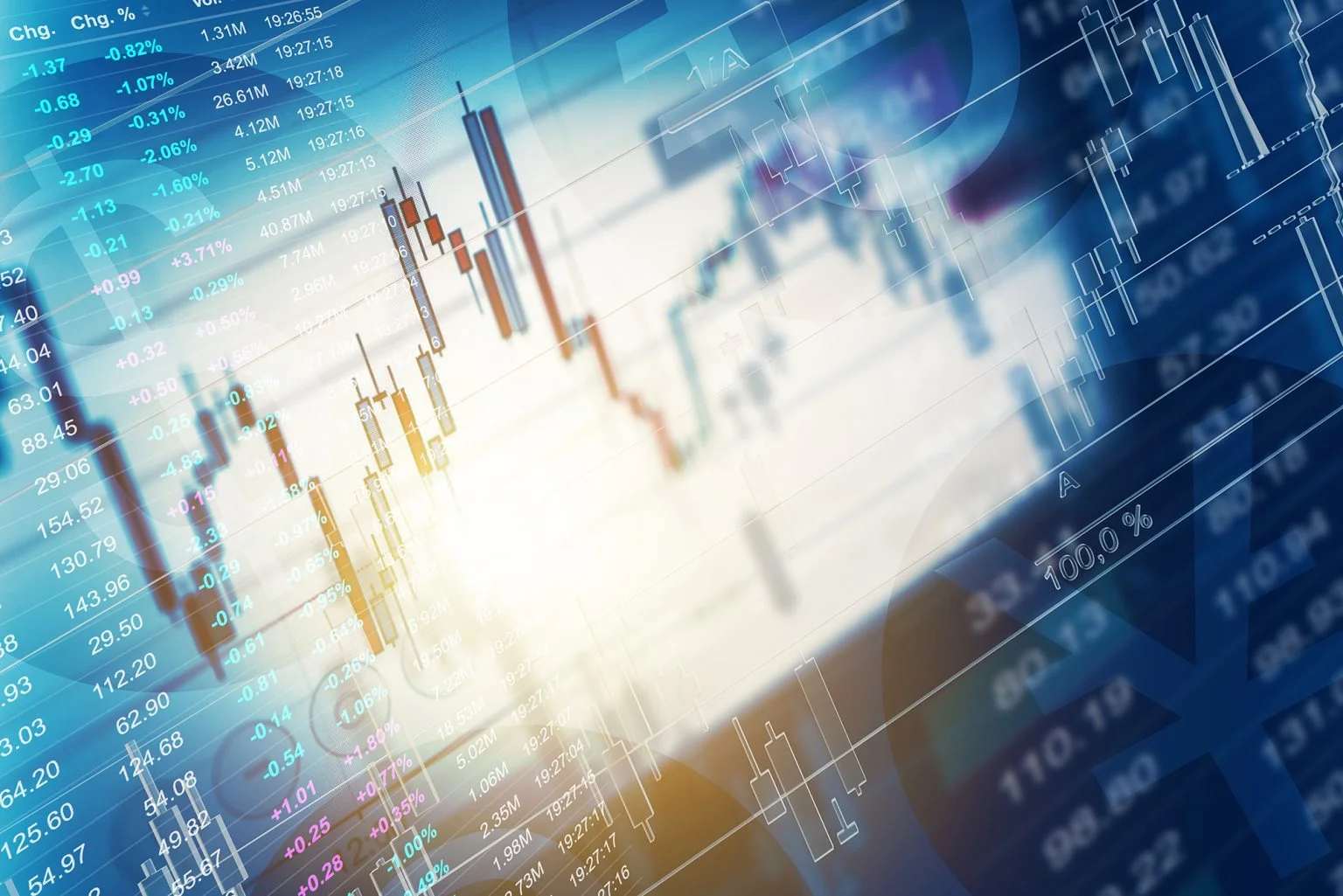 Graphs and stock market tickers laid overtop each other