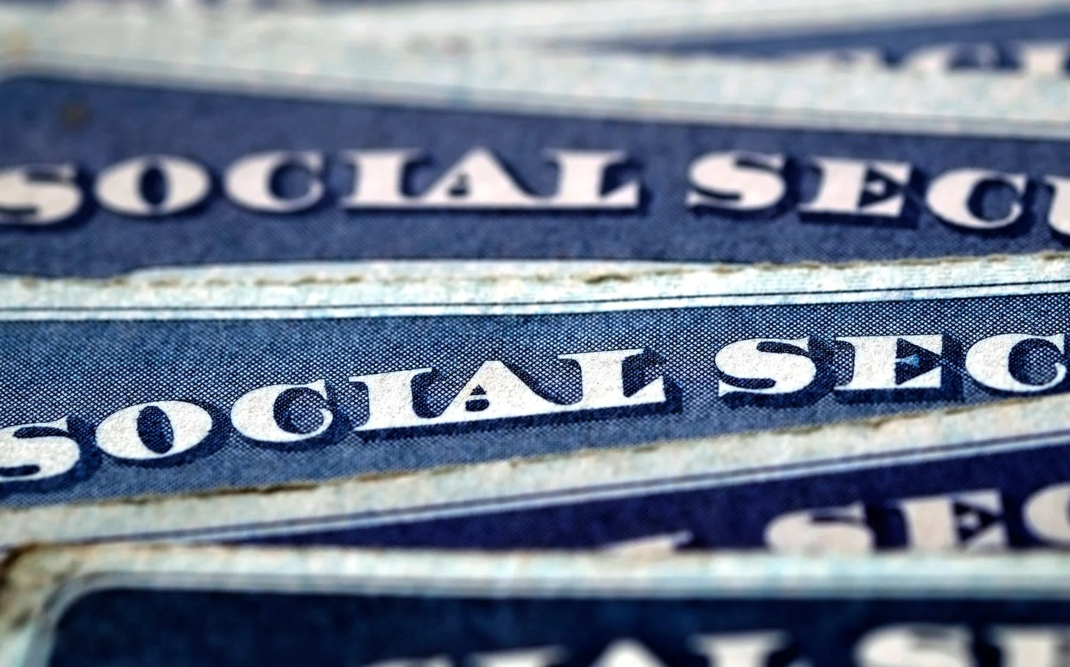 Social Security Cards in a Row Pile