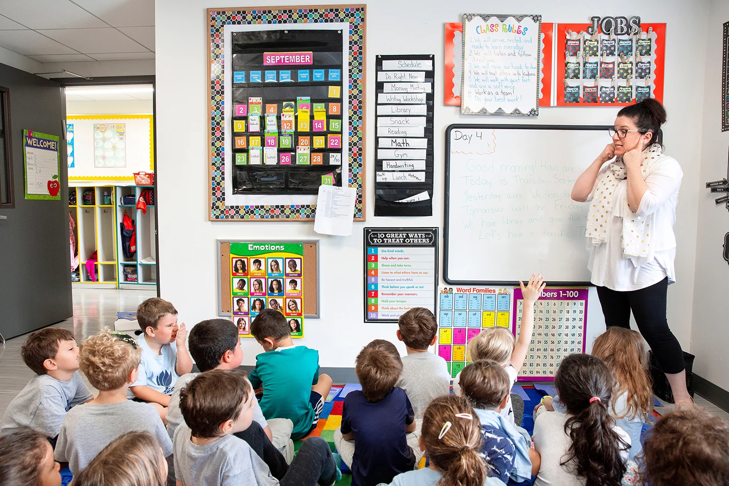 Teacher teaching a classroom full of students