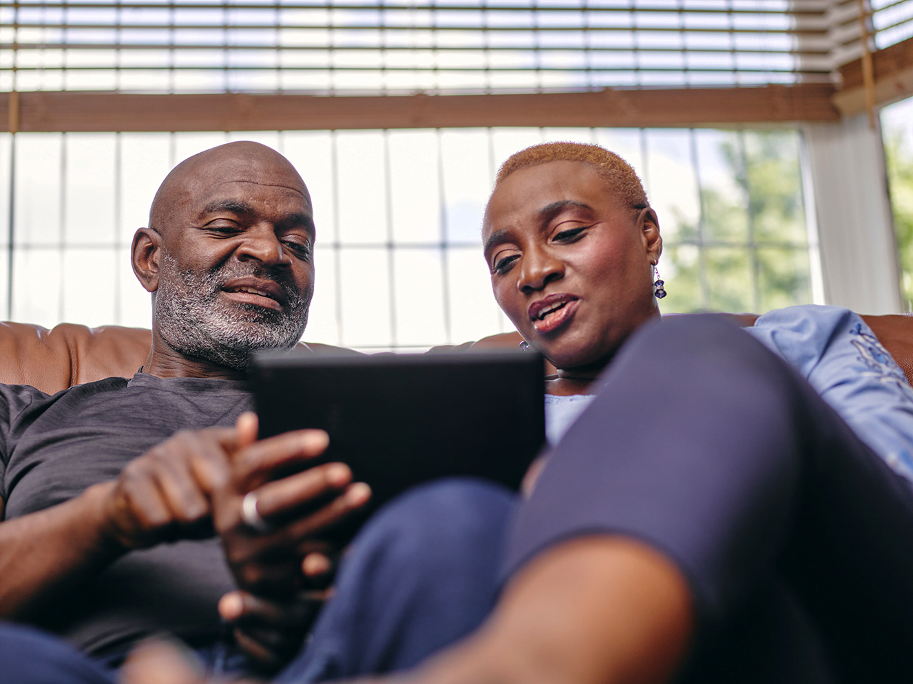 Senior black couple on the laptop computer