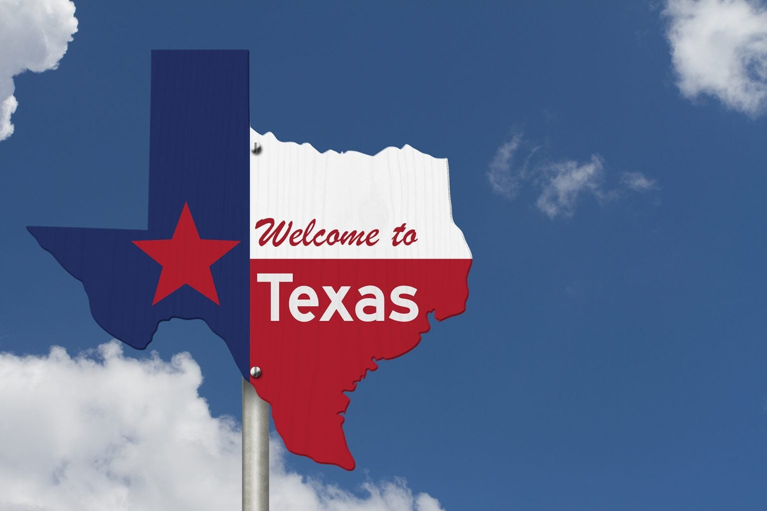Welcome to the state of Texas road sign in the shape of the state map with the flag