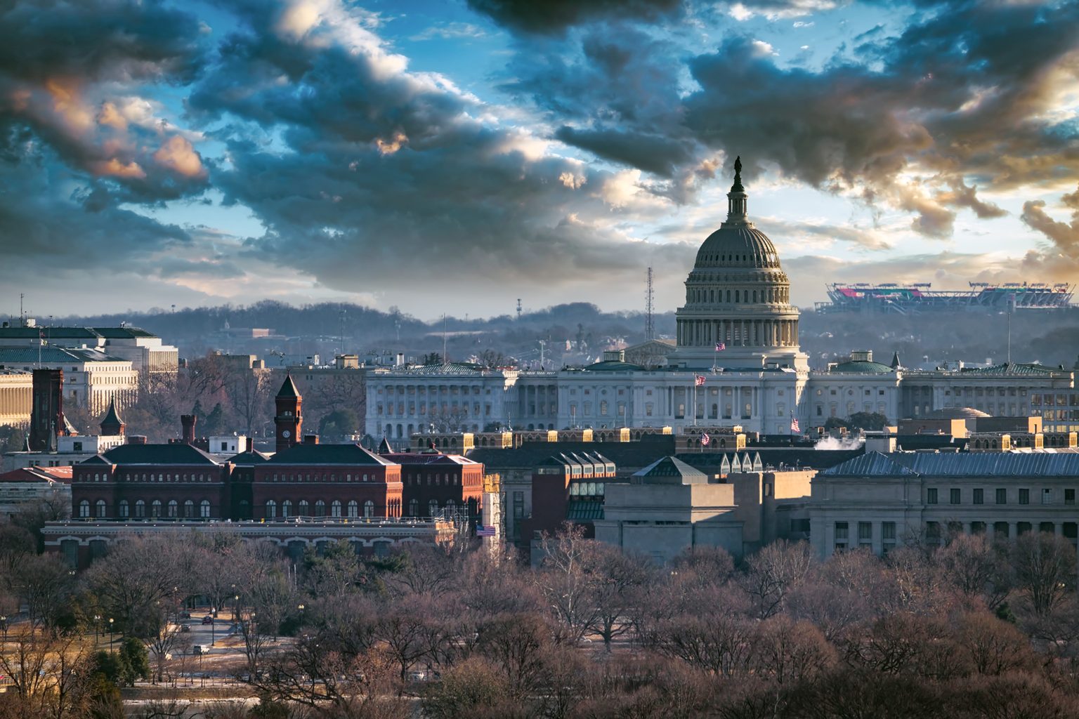 View of US Capitol building with stormy clouds