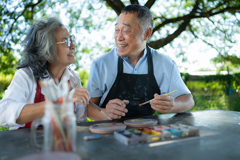 Older couple painting