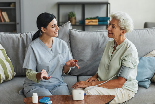 Caregiver and her client at a nursing home
