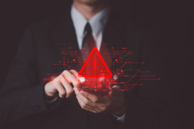 System hacked warning alert on smartphone. Cyber attack on computer network, Virus, Spyware, Malware or Malicious software. Cyber security and cybercrime. Compromised information internet.