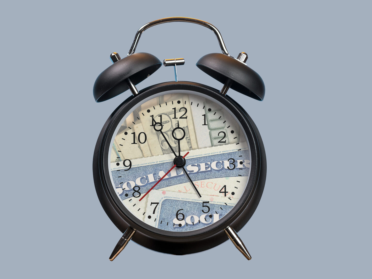 Alarm clock with face replaced by Social Security card and money