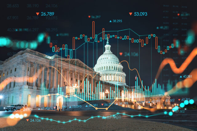 Front view of the Capital Building at night overlayed with stock market icons