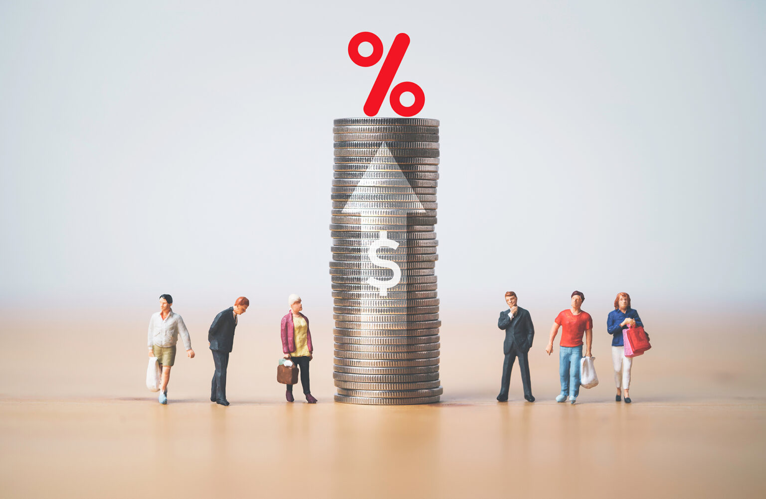 Businessmen and shopper miniature figure standing with high coins stacking , percentage sign , up arrow and dollar symbol